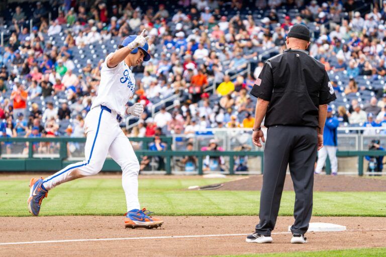 Florida Gators first baseman Jac Caglianone (14) celebrates after hitting a home run against the Kentucky Wildcats during the sixth inning at Charles Schwab Field Omaha. The 75th home run of his career, Caglianone breaks the Florida all-time home run record previously held by Matt LaPorta.