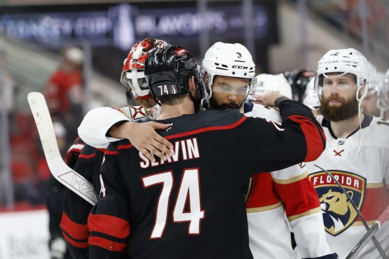Carolina Hurricanes defenseman Jaccob Slavin (74) congratulates Florida Panthers defenseman Seth Jones (3) after the loss in game five of the Eastern Conference Final of the 2025 Stanley Cup Playoffs at Lenovo Center.