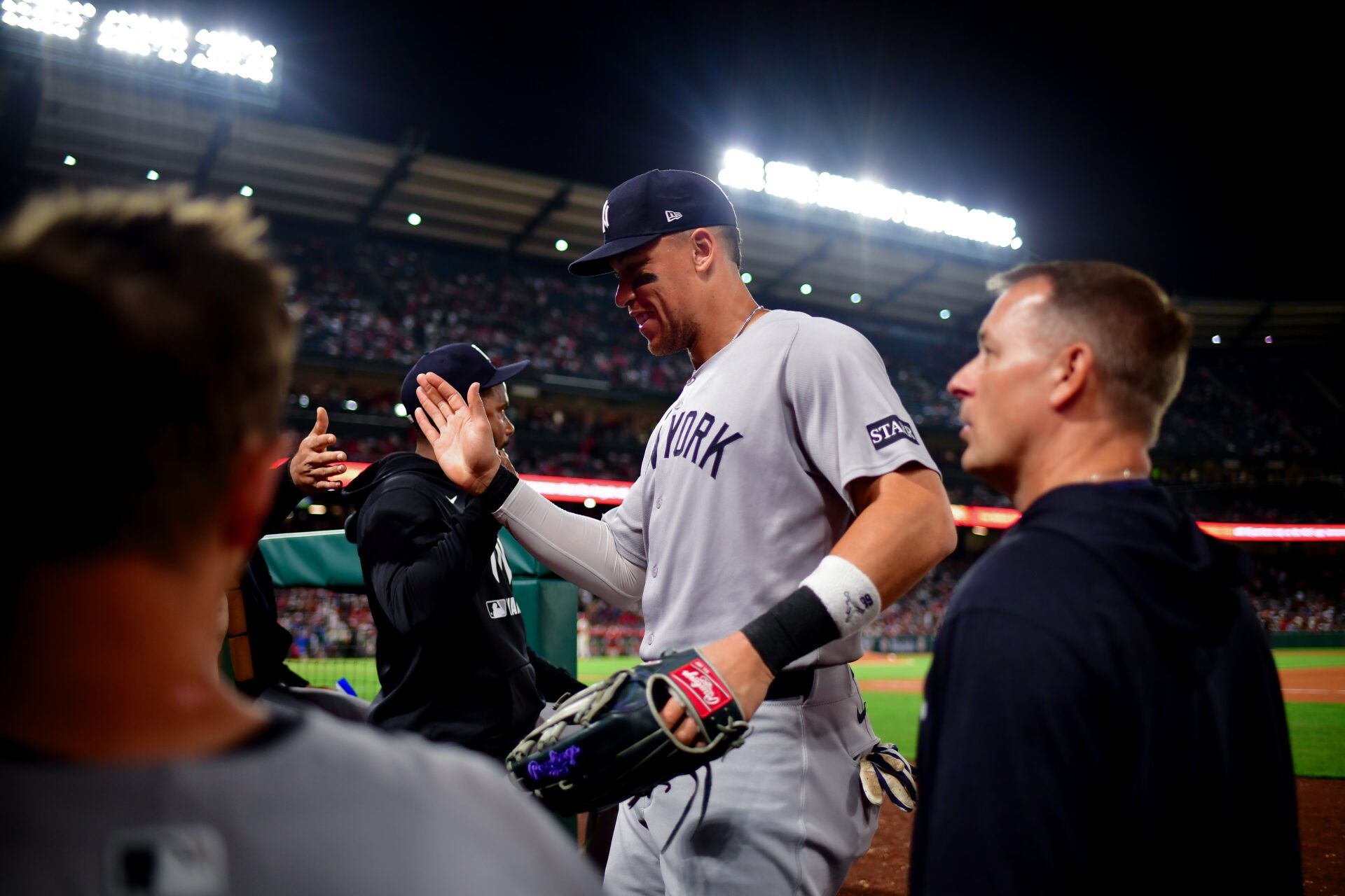 New York Yankees right fielder Aaron Judge (99) is greeted following the seventh inning against the Los Angeles Angels at Angel Stadium.