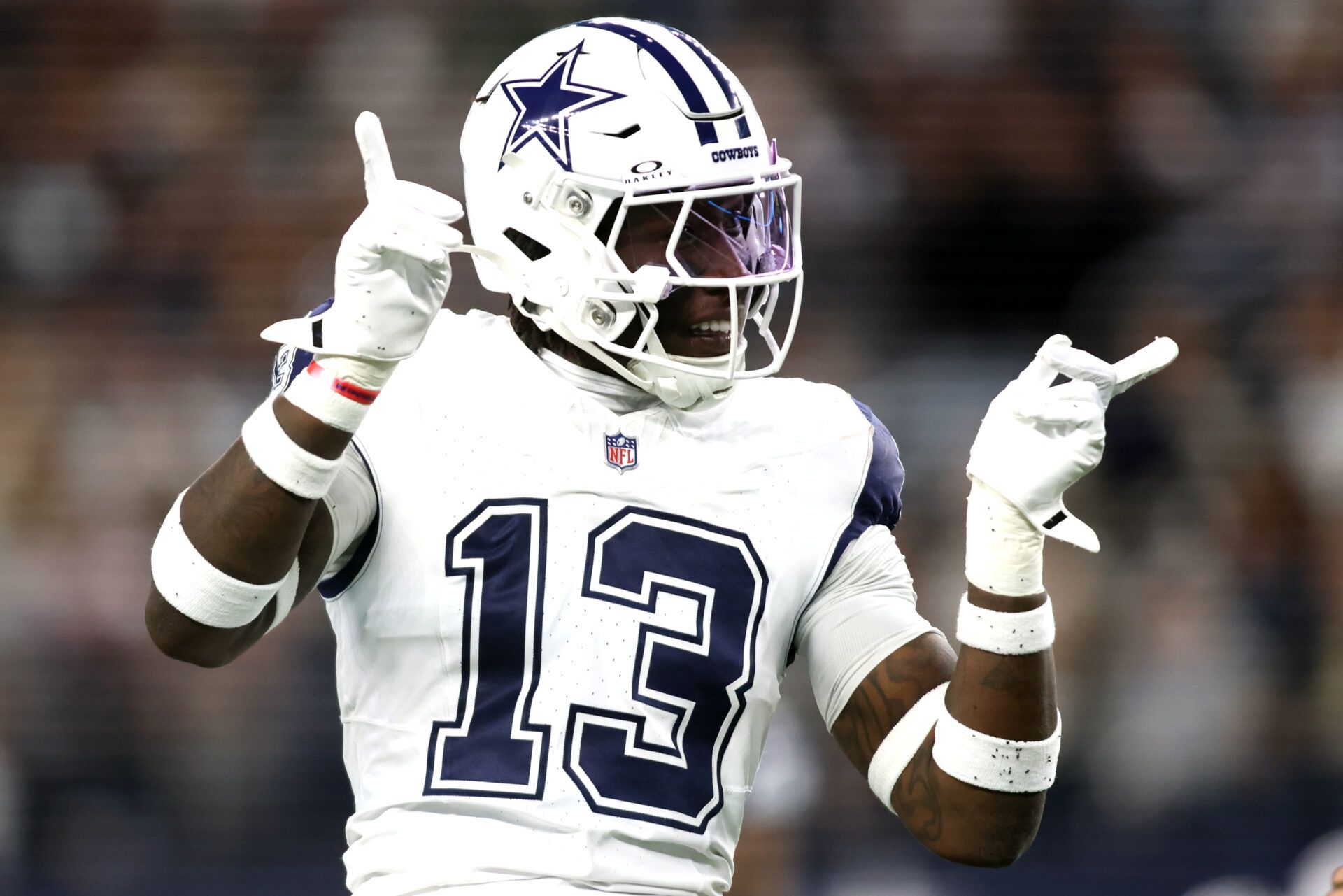 Dallas Cowboys linebacker DeMarvion Overshown (13) reacts after making a tackle against the Cincinnati Bengals in the first quarter  at AT&T Stadium.