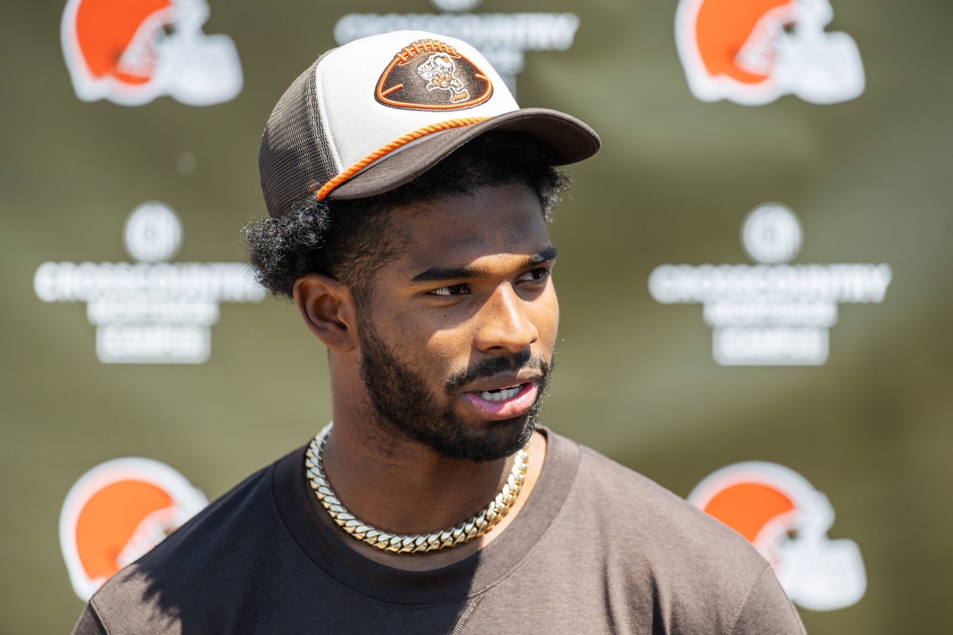 Cleveland Browns quarterback Shedeur Sanders (12) talks to the media during rookie minicamp at CrossCountry Mortgage Campus.