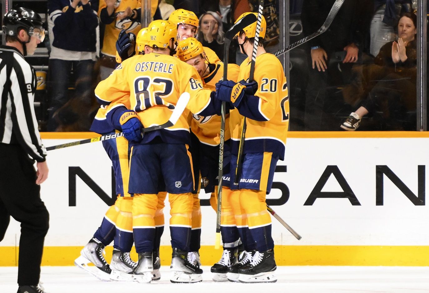 Nashville Predators left wing Michael Bunting (58) celebrates a goal with teammates against the Utah Hockey Club during the second period at Bridgestone Arena.