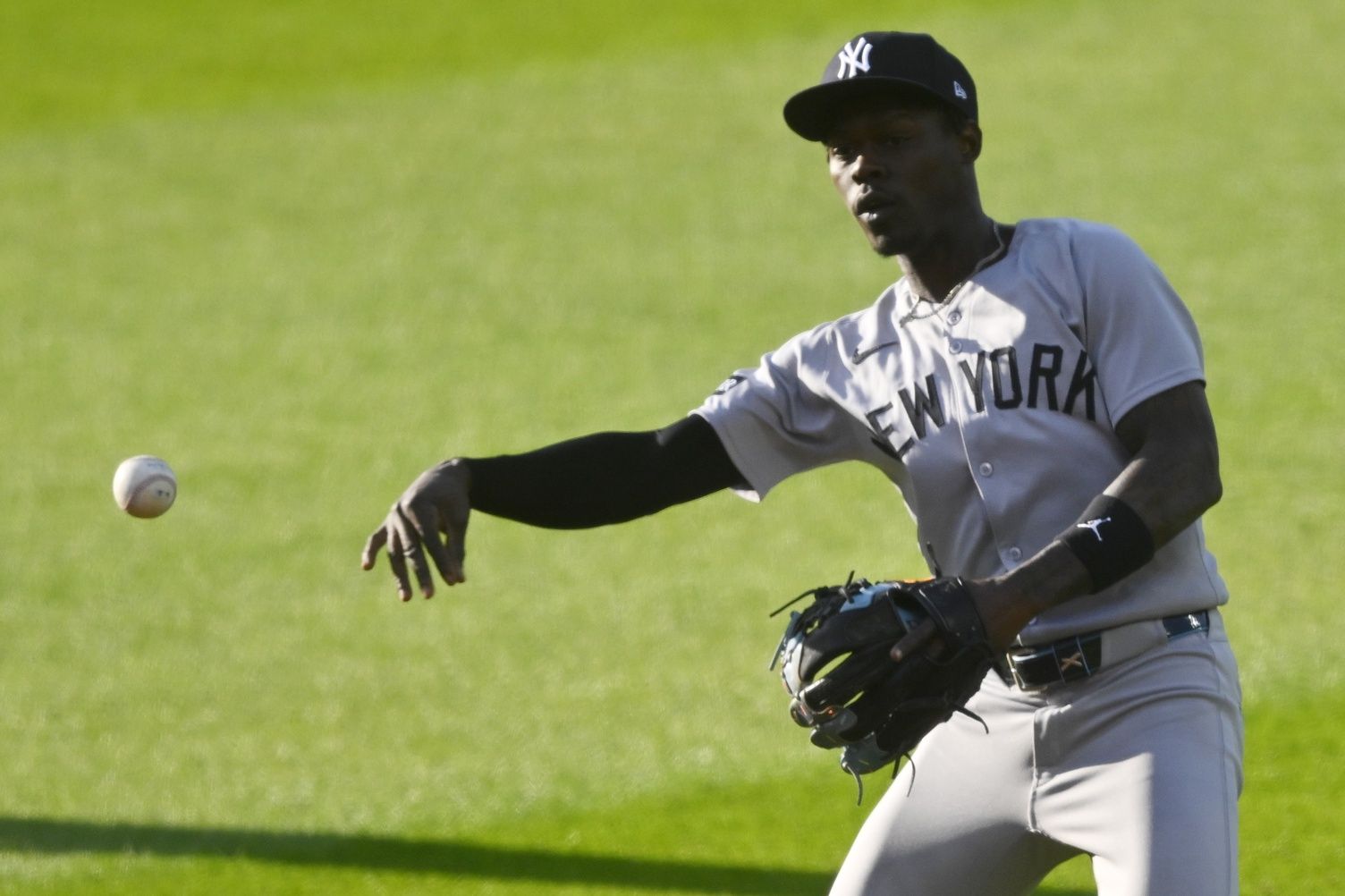 New York Yankees second baseman Jazz Chisholm Jr. (13) throws to first base in the second inning against the Cleveland Guardians at Progressive Field.