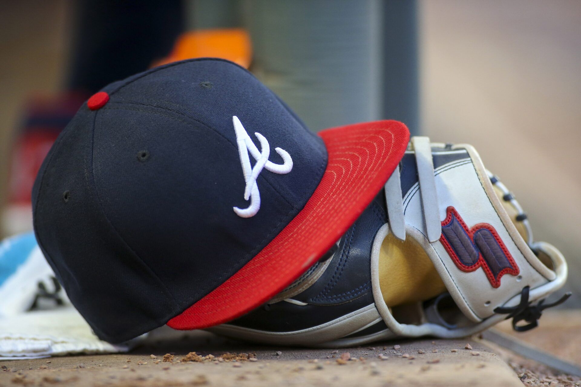 Detailed view of hat and glove of Atlanta Braves center fielder Ronald Acuna Jr. (not pictured) against the Detroit Tigers in the fourth inning at SunTrust Park.