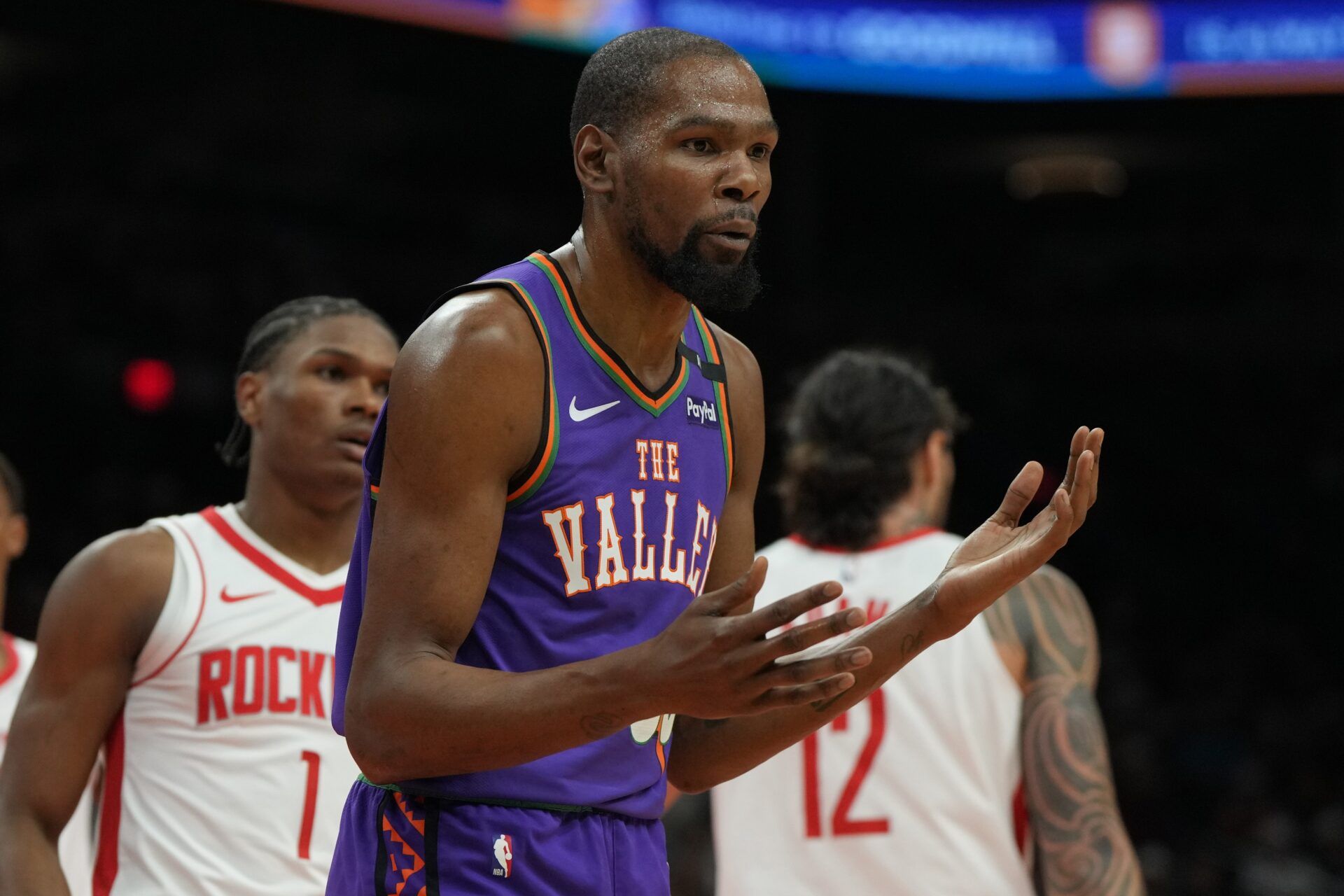 Phoenix Suns forward Kevin Durant (35) reacts after fouling a Houston Rockets player in the first half at Footprint Center.