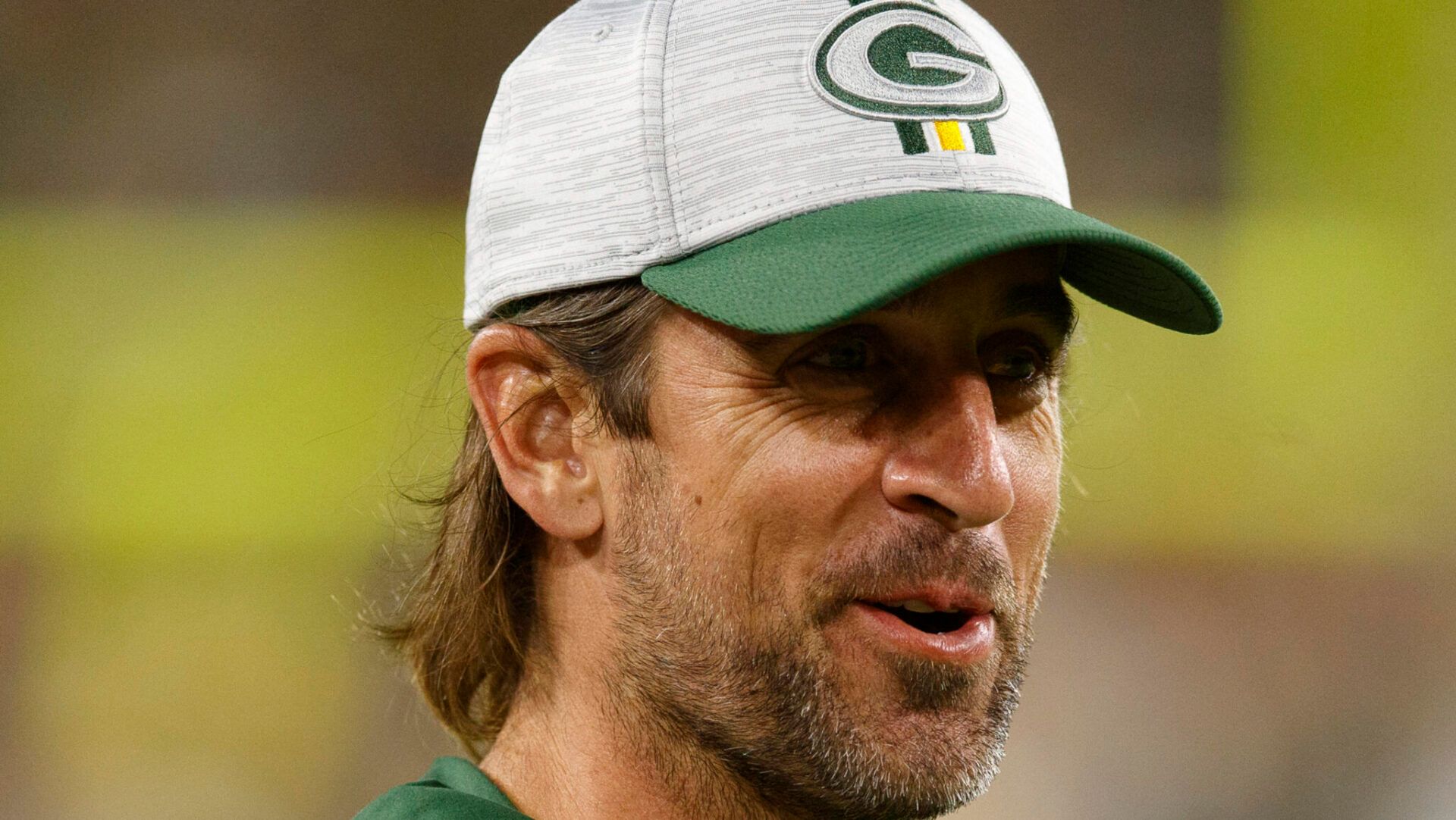 Green Bay Packers quarterback Aaron Rodgers stands on the sidelines during the second quarter against the Houston Texans at Lambeau Field.