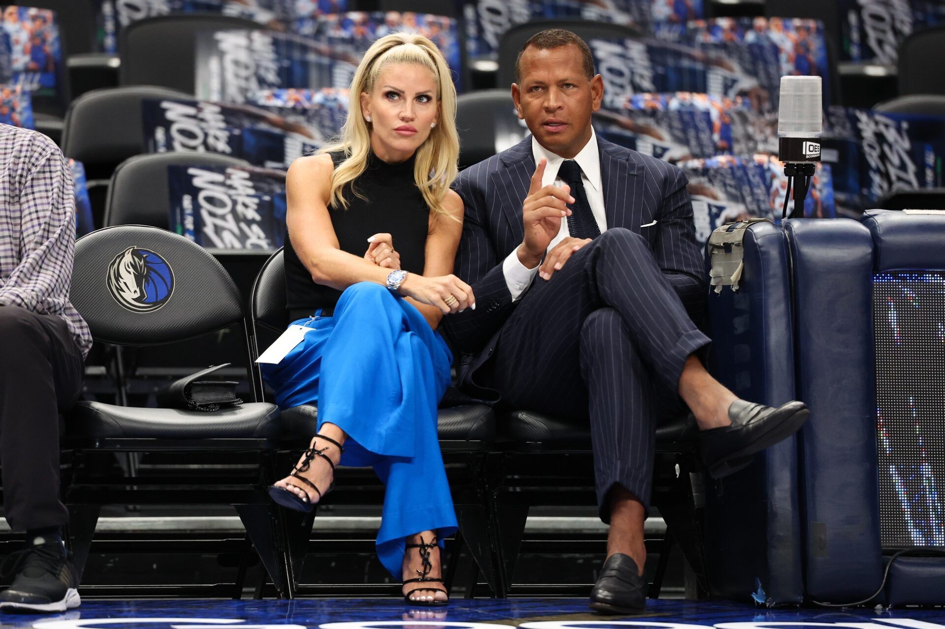 Jaclyn Cordeiro and Alex Rodriguez watch warm ups before game four of the western conference finals between the Dallas Mavericks and the Minnesota Timberwolves for the 2024 NBA playoffs at American Airlines Center.