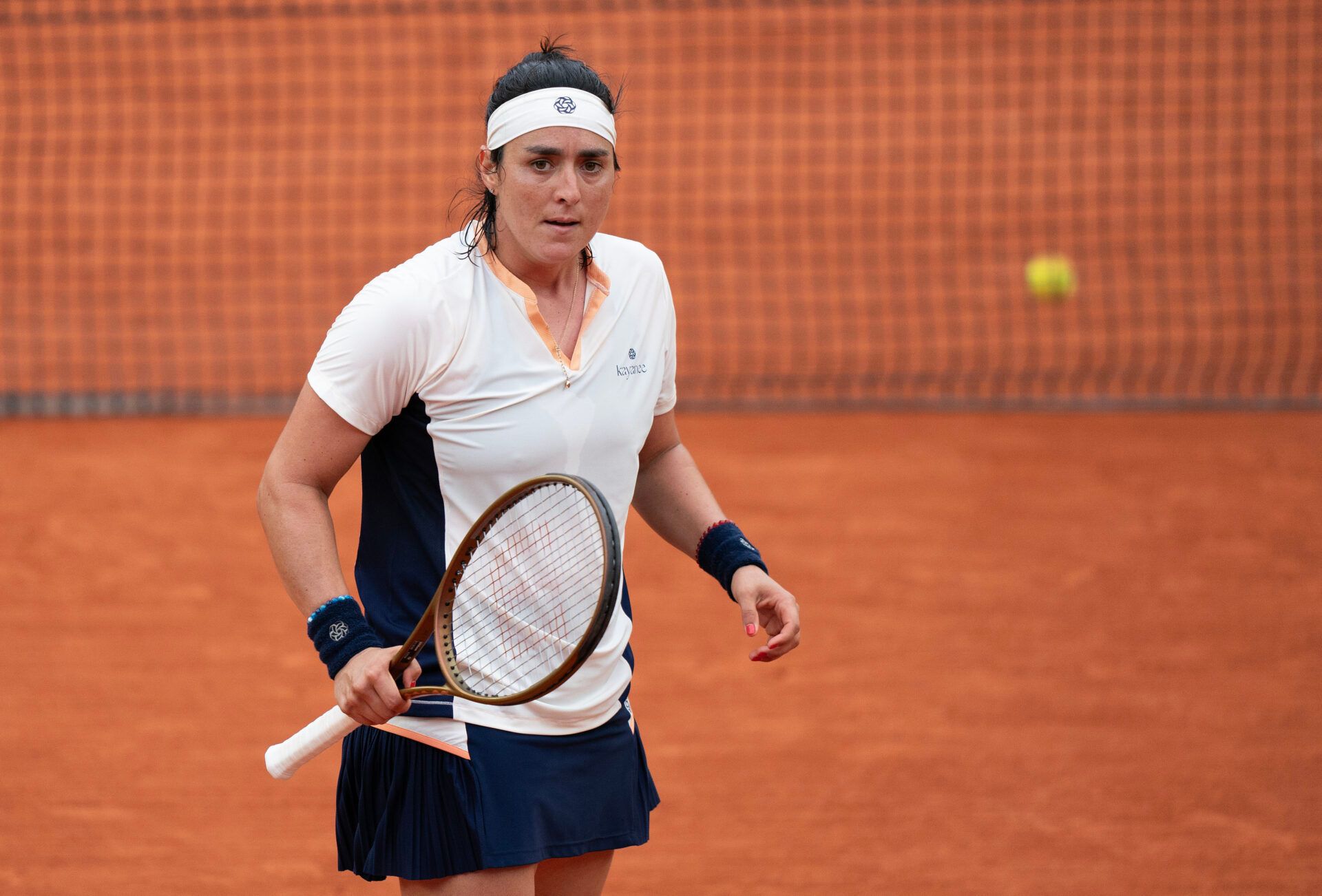 Ons Jabeur of Tunisia reacts to a point during her match against Leylah Fernandez of Canada on day six of Roland Garros at Stade Roland Garros.