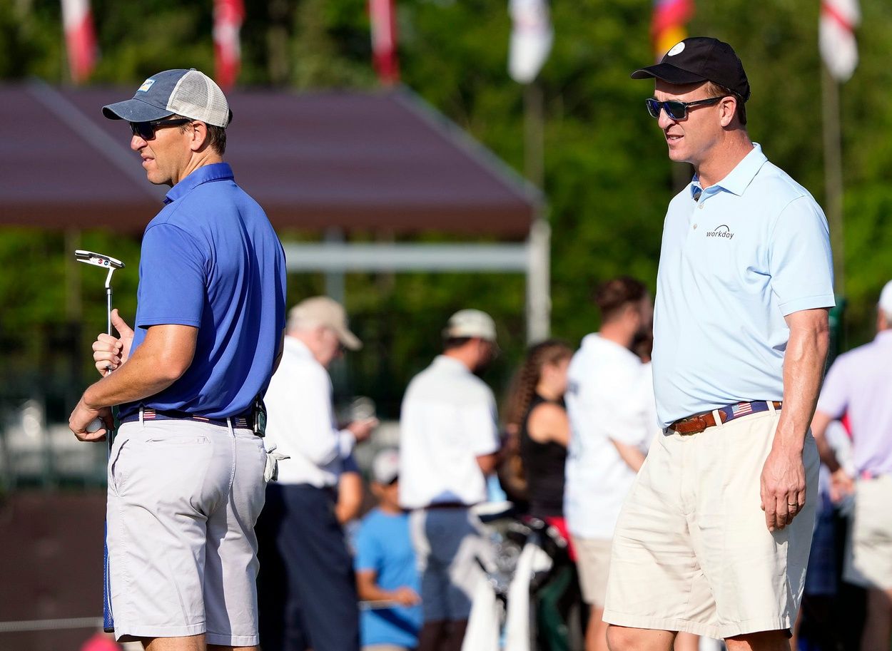 Eli Manning and Peyton Manning practice their putts before teeing off during the Workday Golden Bear Pro-Am during the Memorial Tournament at Muirfield Village Golf Club in Dublin, Ohio on June 1, 2022.

Pga Memorial Tournament Pro Am