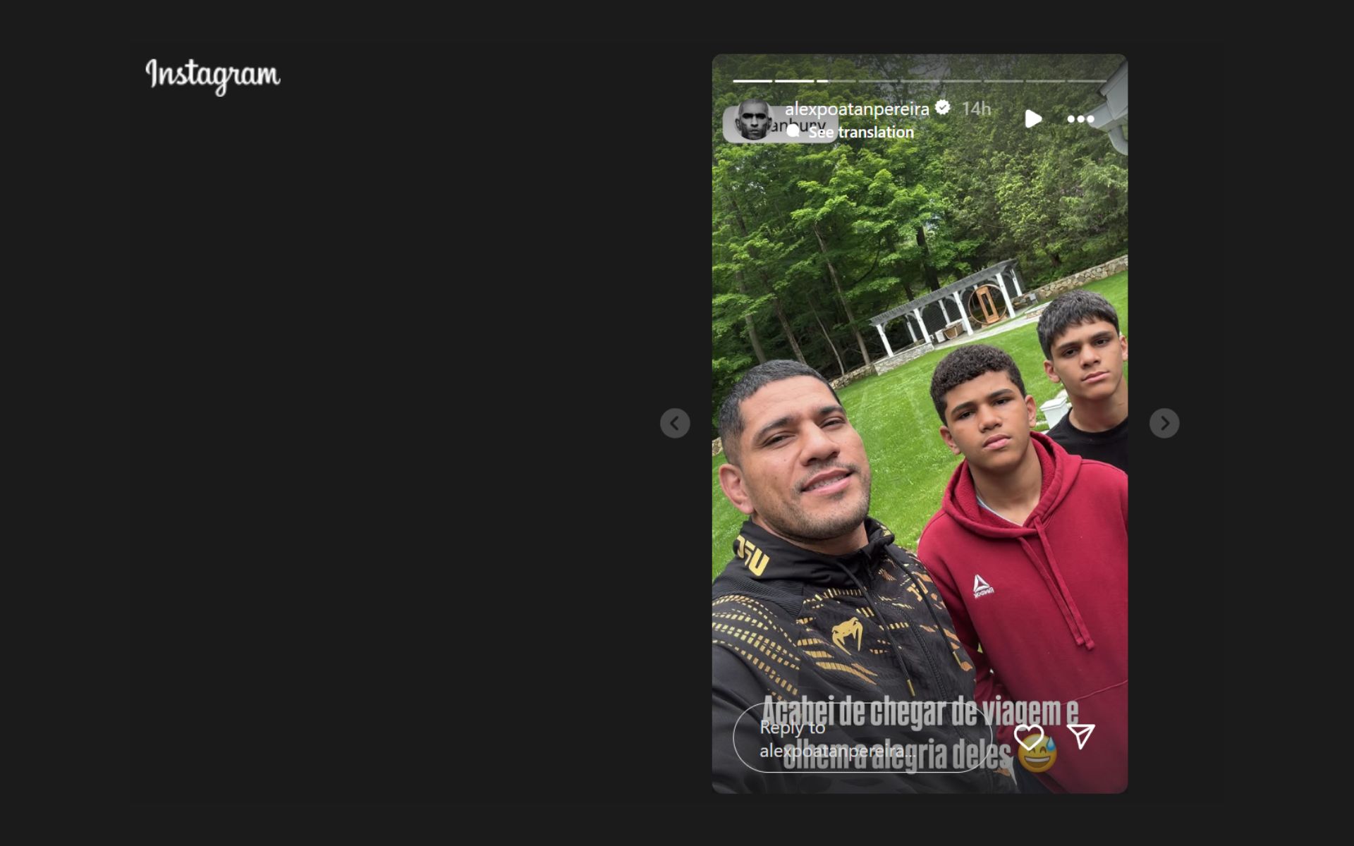 Alex Pereira with his sons showing serious expressions