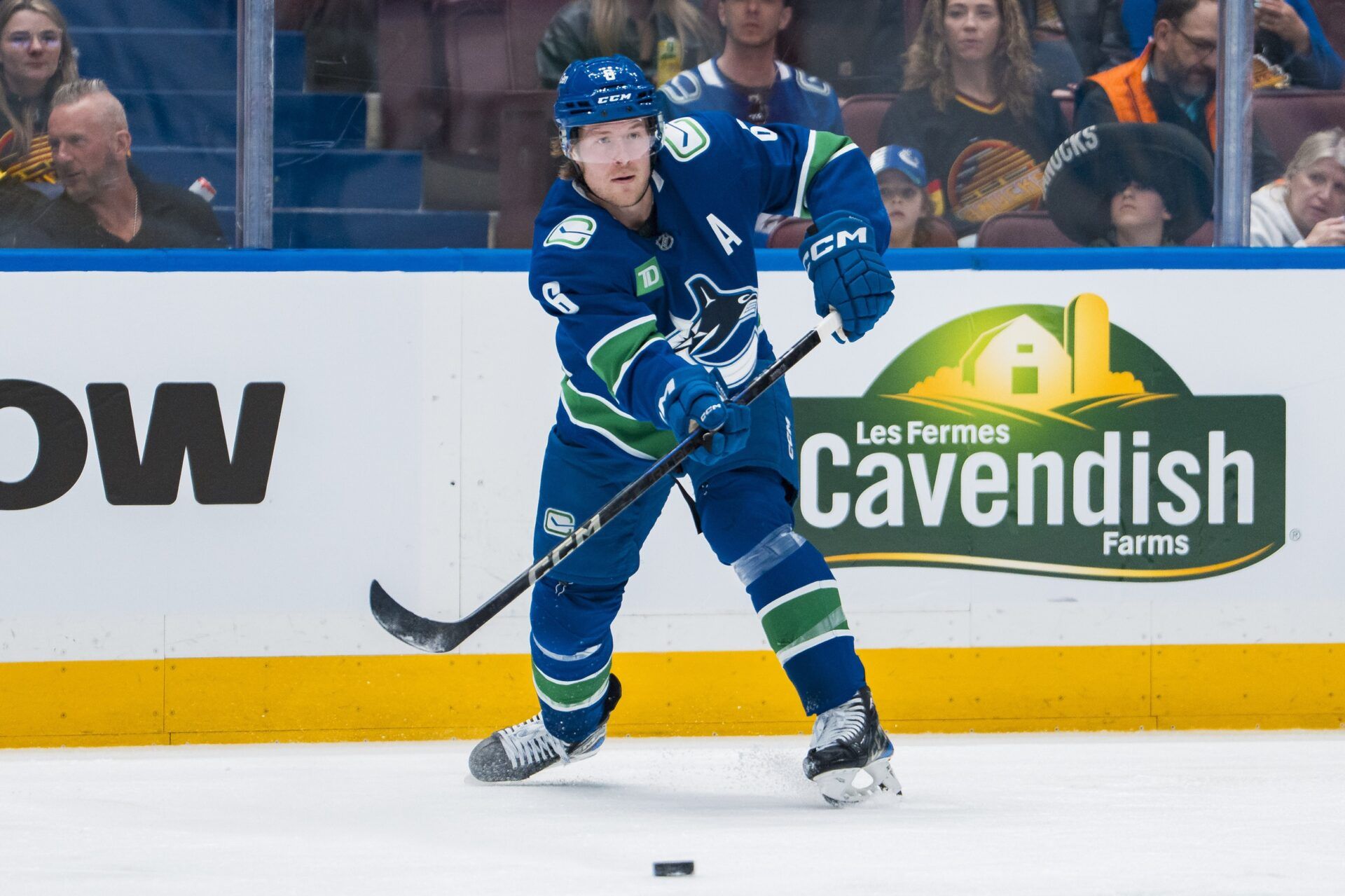 Vancouver Canucks forward Brock Boeser (6) makes a pass against the Minnesota Wild in the second period at Rogers Arena.