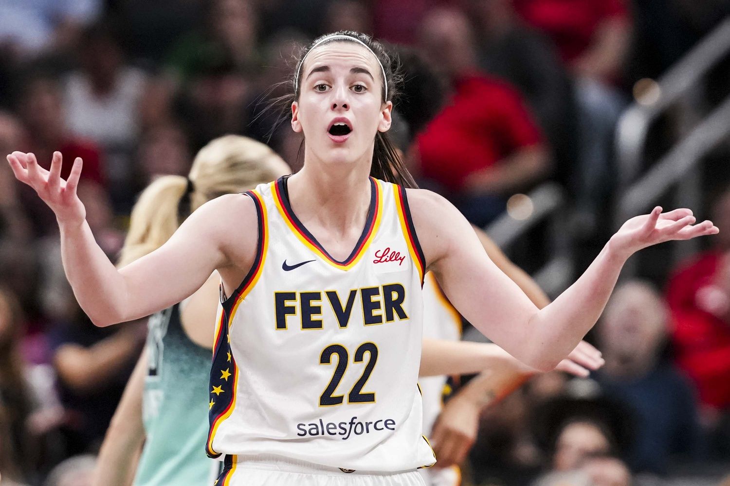 Indiana Fever guard Caitlin Clark (22) reacts to the officiating during a game between the Indiana Fever and the New York Liberty at Gainbridge Fieldhouse.