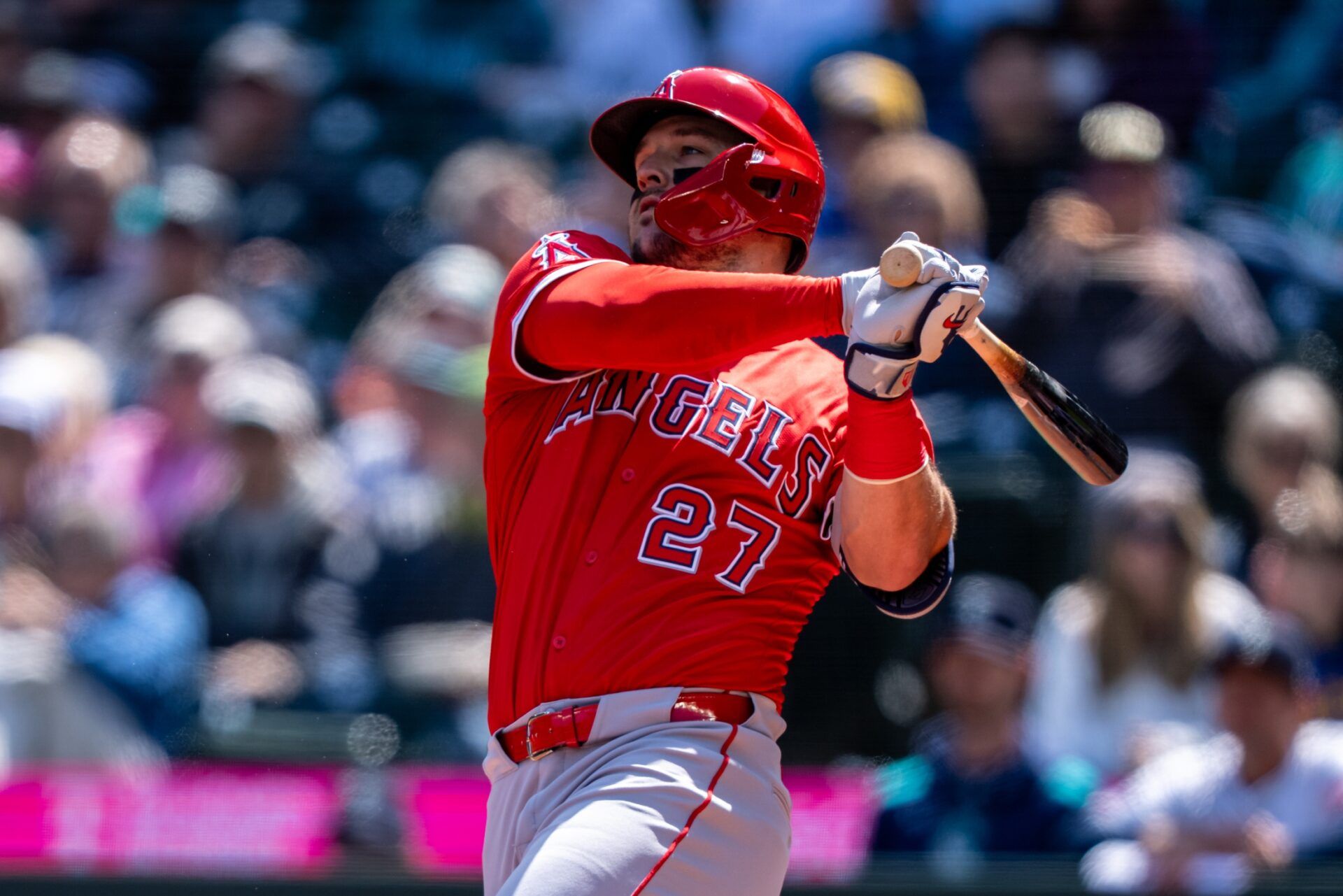 Los Angeles Angels right fielder Mike Trout (27) takes a swing during an at-bat against the Seattle Mariners at T-Mobile Park.