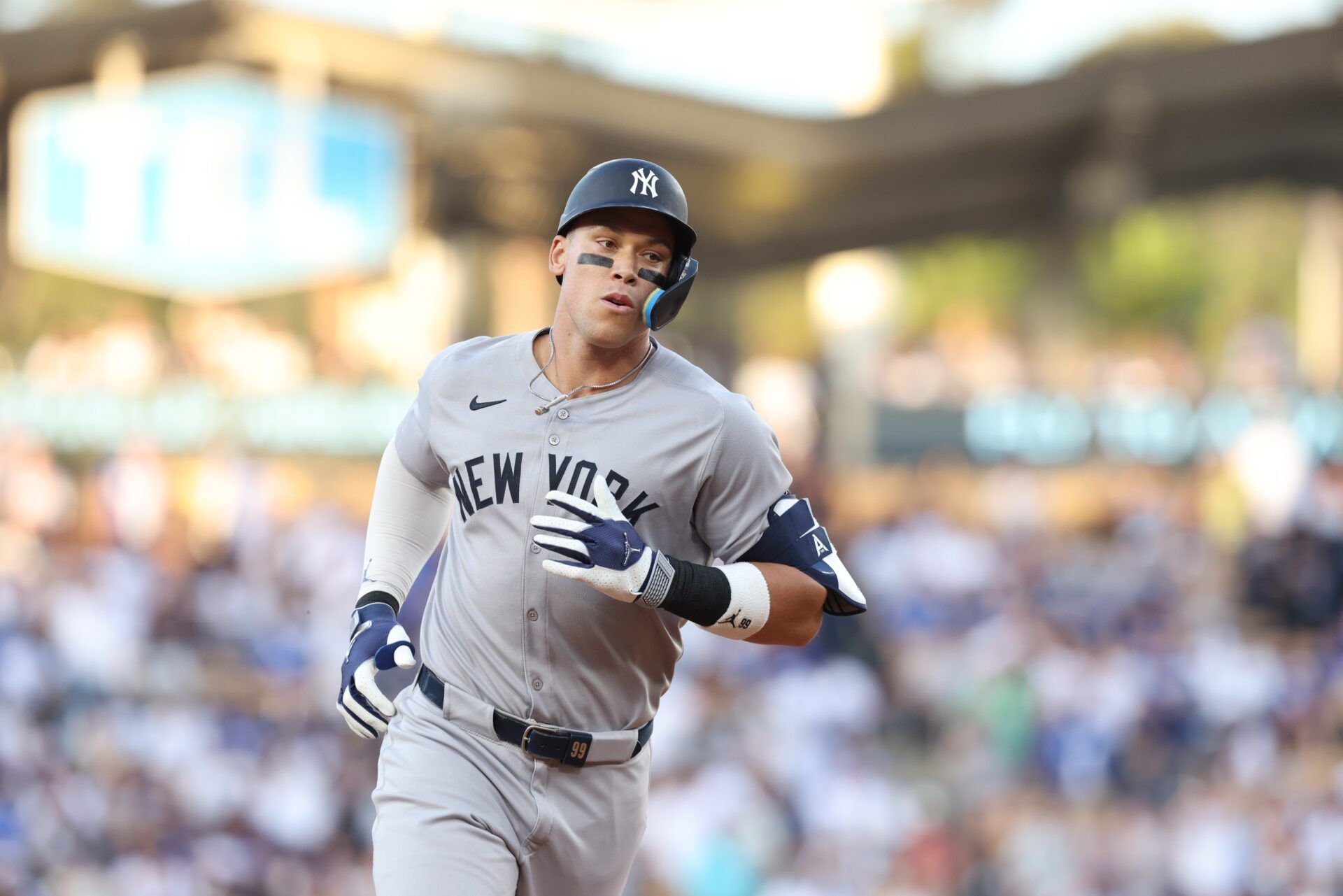 New York Yankees rightfielder Aaron Judge (99) rounds the bases after a home run during the first inning against the Los Angeles Dodgers at Dodger Stadium.
