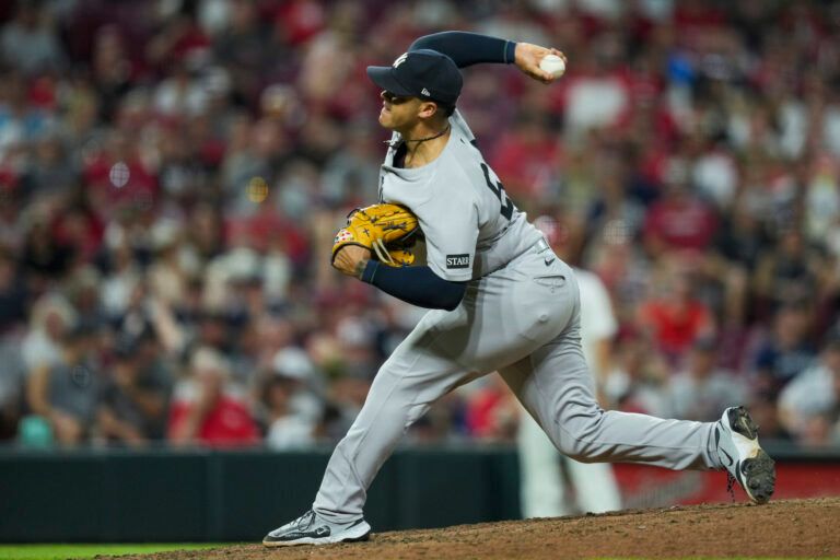New York Yankees pitcher Fernando Cruz throws against the Cincinnati Reds in the eighth inning at Great American Ball Park.