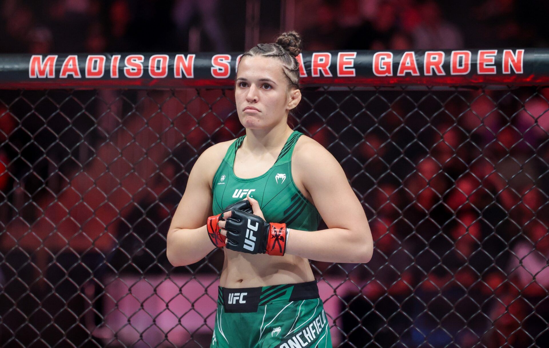 Erin Blanchfield (red gloves) and Molly McCann (blue gloves) during UFC 281 at Madison Square Garden.