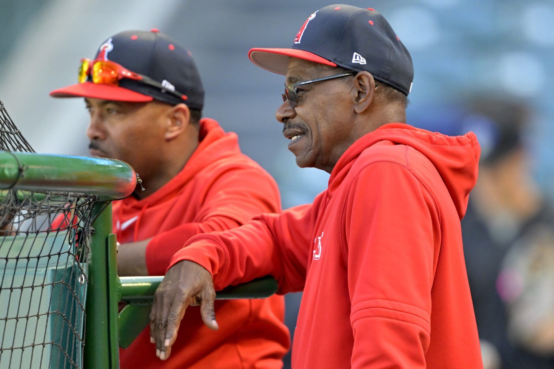 Los Angeles Angels manager Ron Washington (37), right, talks with hitting coach Johnny Washington (82) during batting practice prior to the game against the Boston Red Sox at Angel Stadium.