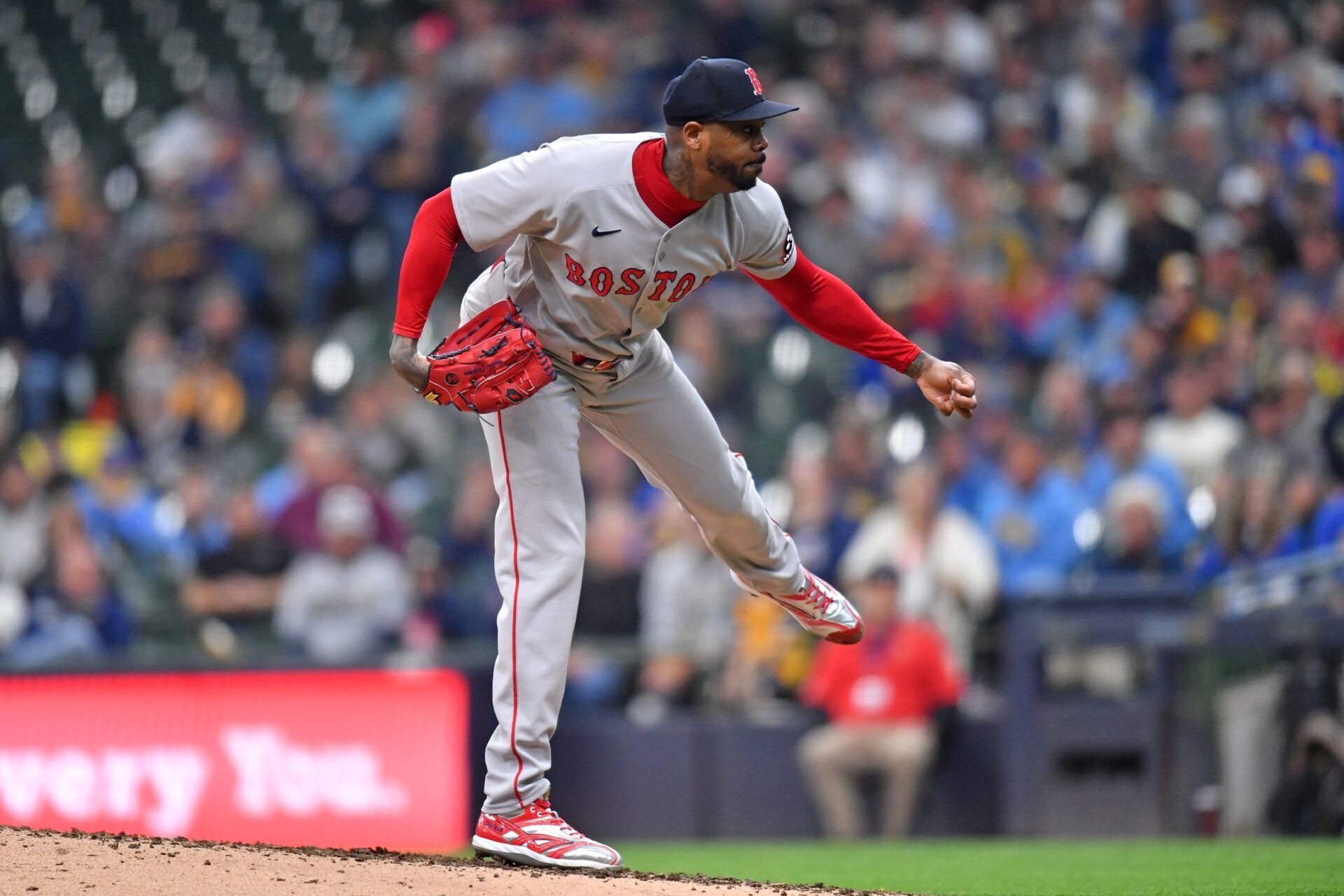 Boston Red Sox pitcher Aroldis Chapman (44) pitches during the ninth inning against the Milwaukee Brewers at American Family Field.