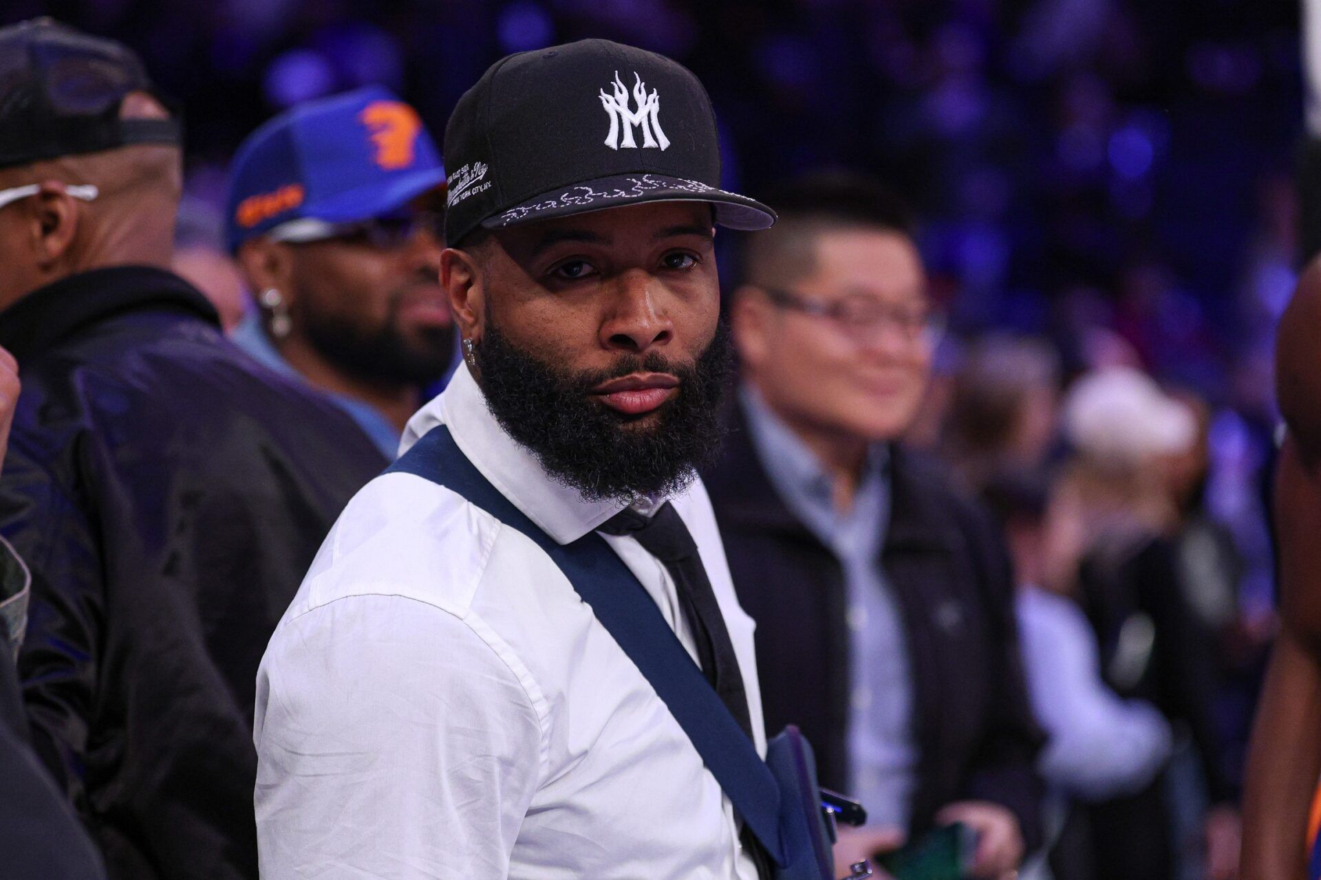 NFL wide receiver Odell Beckham Jr. sits courtside during the second half of the NBA game between the New York Knicks and the Phoenix Suns at Madison Square Garden.
