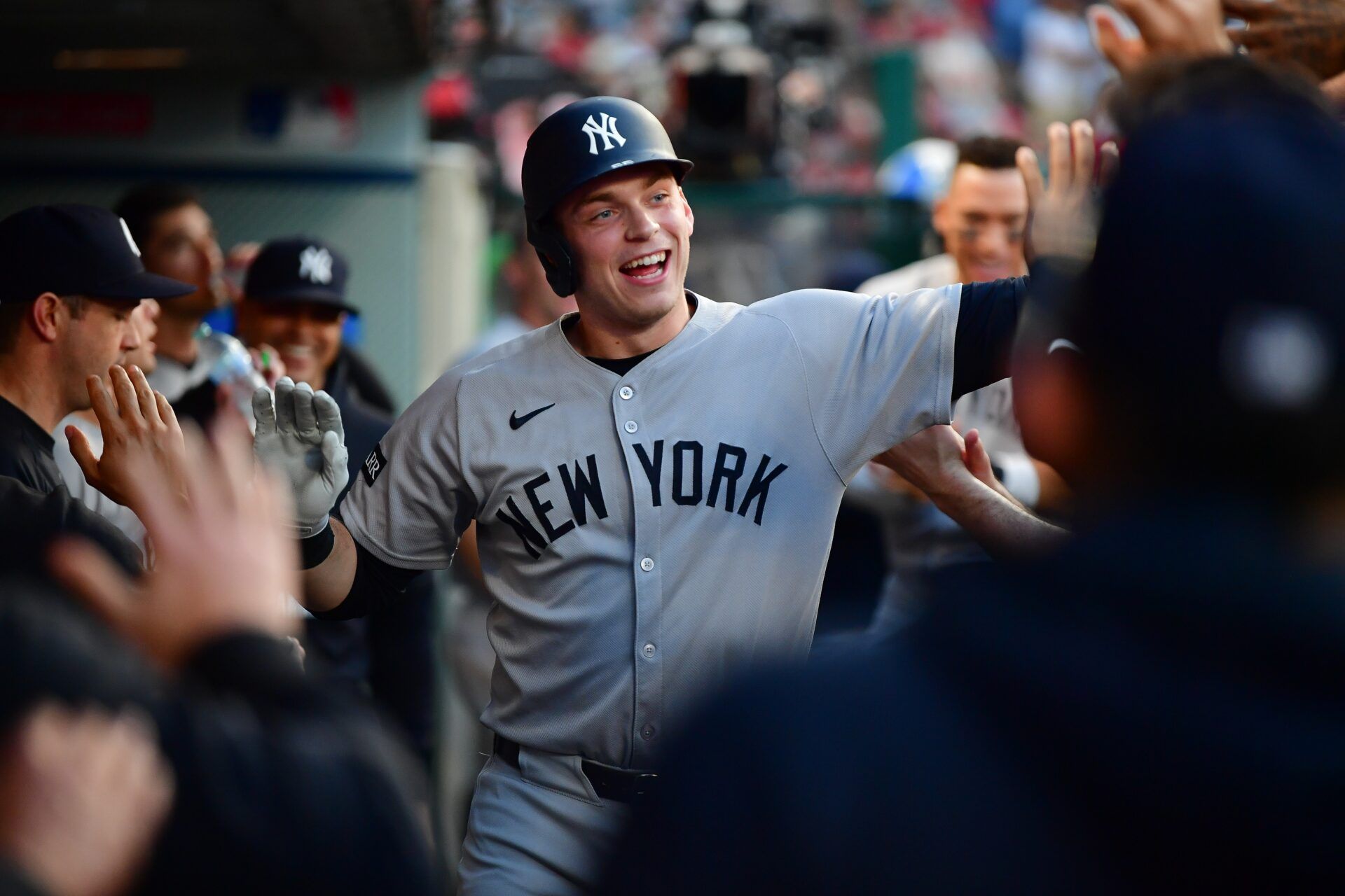 New York Yankees designated hitter Ben Rice (22) is greeted after hitting a solo home run against the Los Angeles Angels during the fourth inning at Angel Stadium.