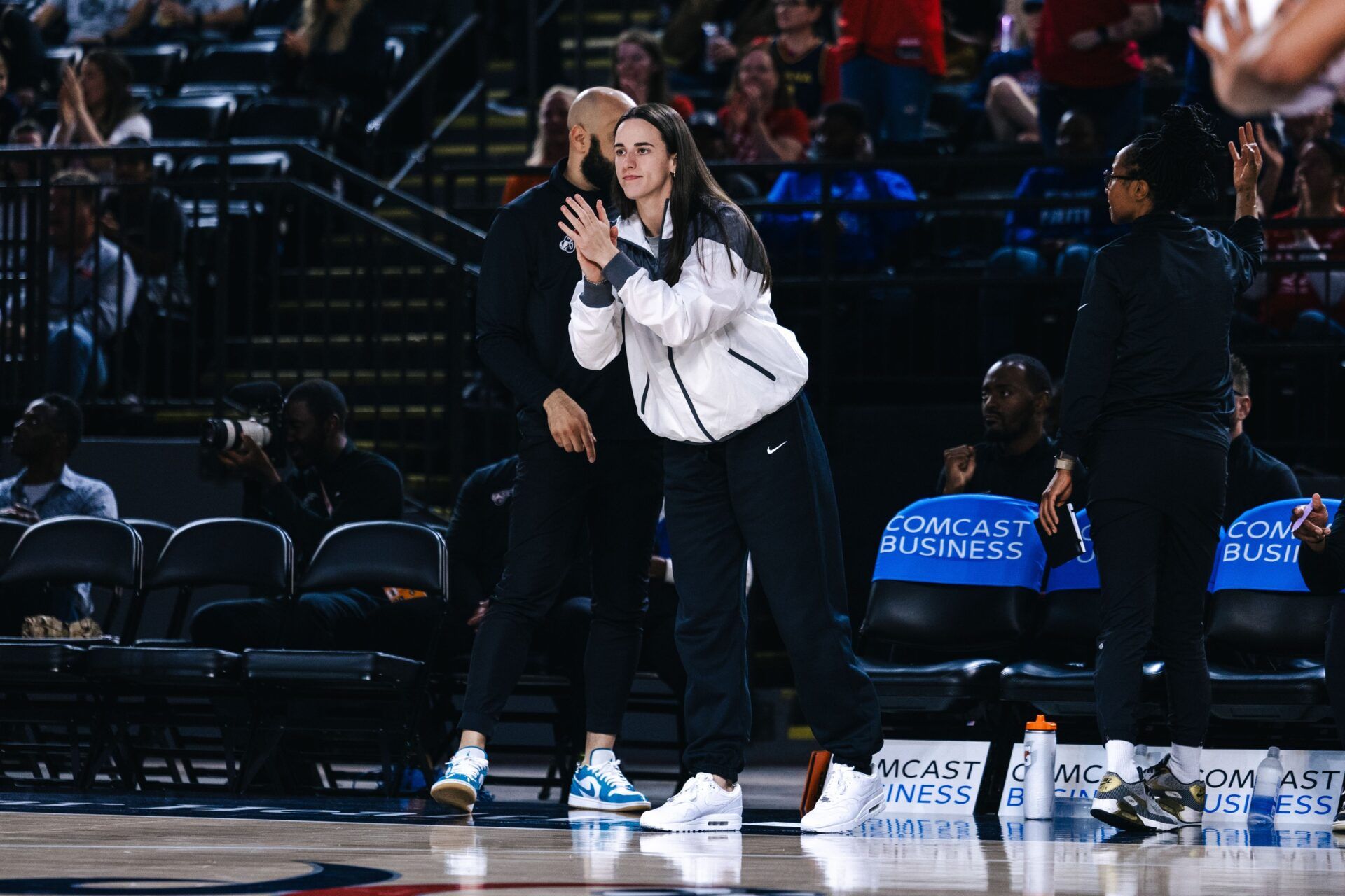 Indiana Fever guard Caitlin Clark reacts from the sideline in the first half against the Washington Mystics at Entertainment & Sports Arena.