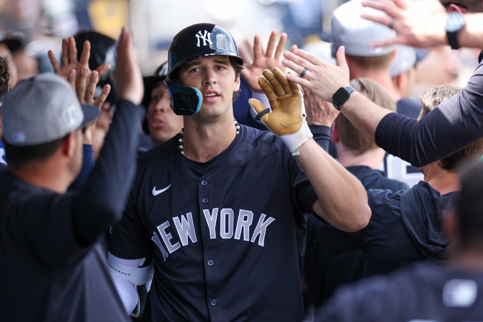 New York Yankees outfielder Spencer Jones (78) celebrates after hitting a three-run home run against the Philadelphia Phillies in the third inning during spring training at BayCare Ballpark.