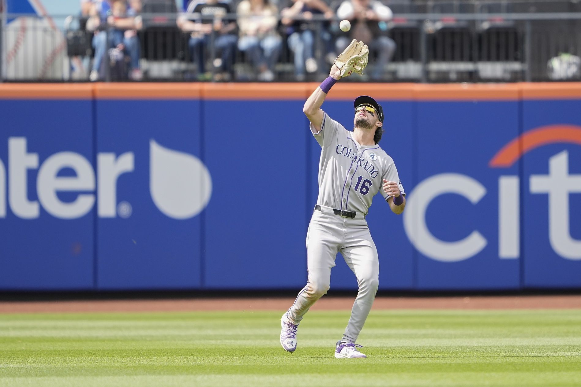 Colorado Rockies center fielder Sam Hilliard (16) catches a fly ball hit by New York Mets first baseman Pete Alonso (20) (not pictured) during the eighth inning at Citi Field.