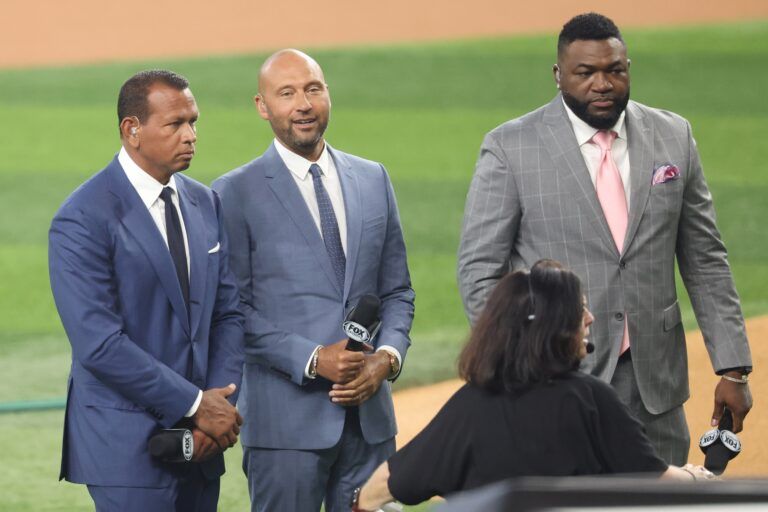 New York Yankees former players Alex Rodriguez and Derek Jeter and Boston Reds Sox former player David Ortiz look on before the 2024 MLB All-Star game at Globe Life Field.