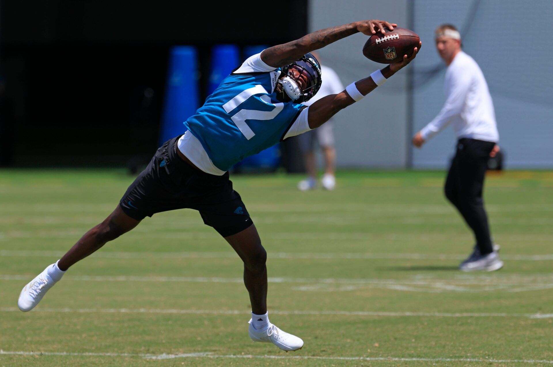 Jacksonville Jaguars wide receiver Travis Hunter (12) catches a pass during the first organized team activity at Miller Electric Center Monday, May 19, 2025 in Jacksonville, Fla.