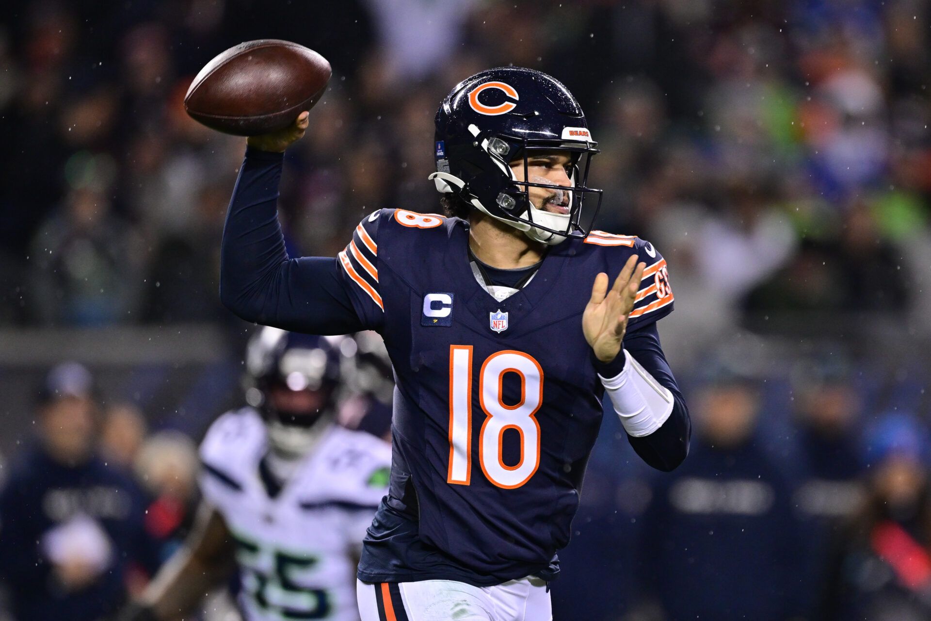 Chicago Bears quarterback Caleb Williams (18) passes the ball against the Seattle Seahawks during the first quarter at Soldier Field.