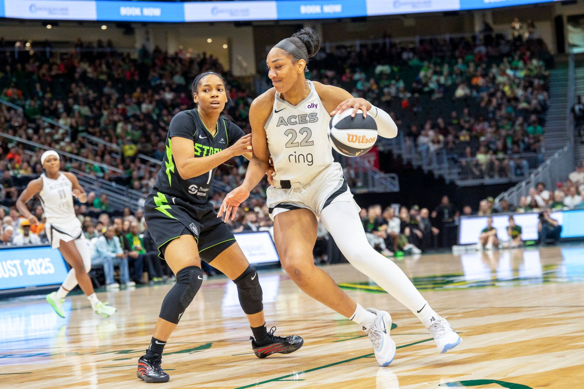 Las Vegas Aces center A'ja Wilson (22) takes the ball towards to the basket against Seattle Storm guard Zia Cooke (7)  in the fourth period at Climate Pledge Arena.