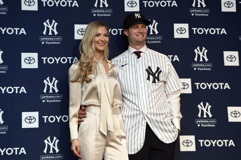 New York Yankees pitcher Gerrit Cole poses for photos with his wife Amy at Legends Club at Yankee Stadium.