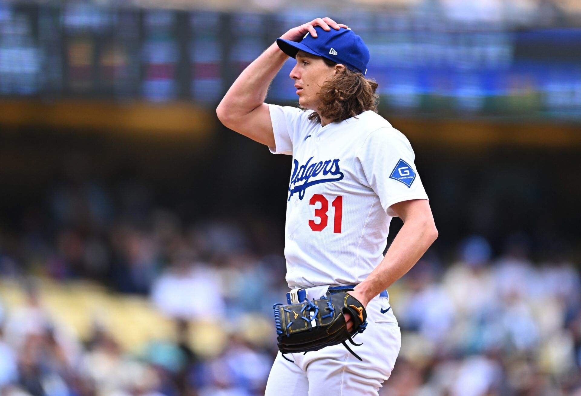 Los Angeles Dodgers pitcher Tyler Glasnow (31) reacts after a pitch during the first inning against the Pittsburgh Pirates at Dodger Stadium.