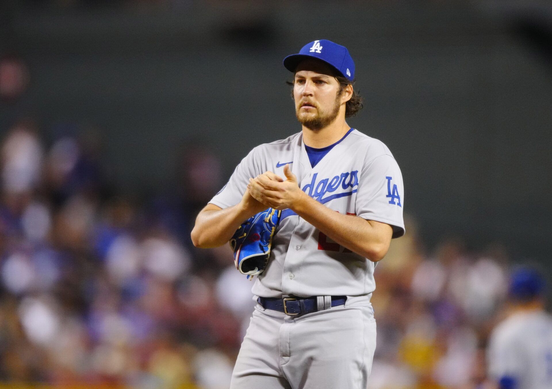 Los Angeles Dodgers pitcher Trevor Bauer reacts against the Arizona Diamondbacks at Chase Field.