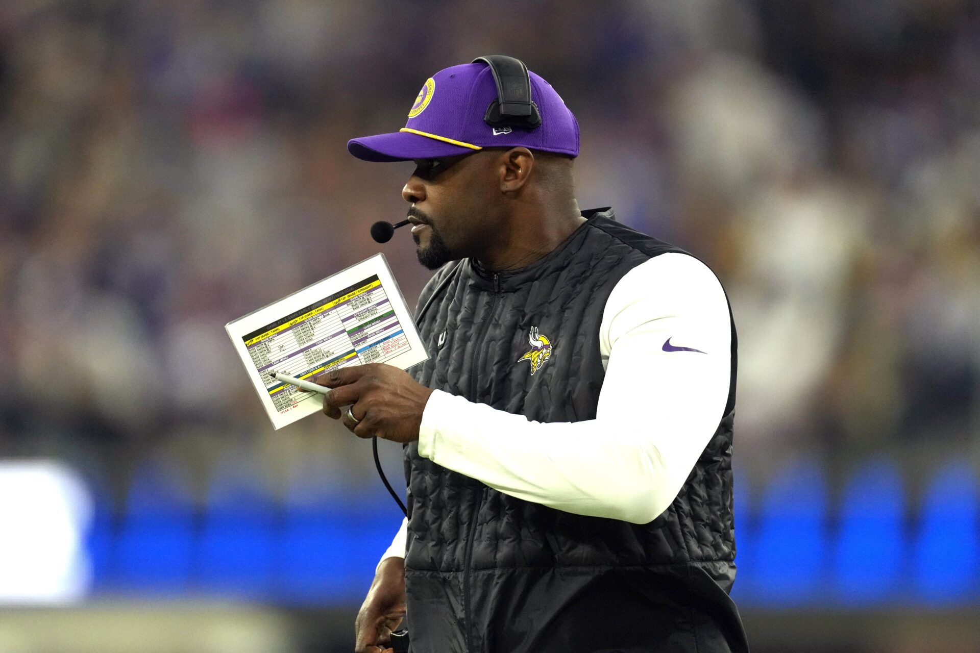 Minnesota Vikings defensive coordinator Brian Flores watches from the sidelines against the Los Angeles Rams in the first half at SoFi Stadium.