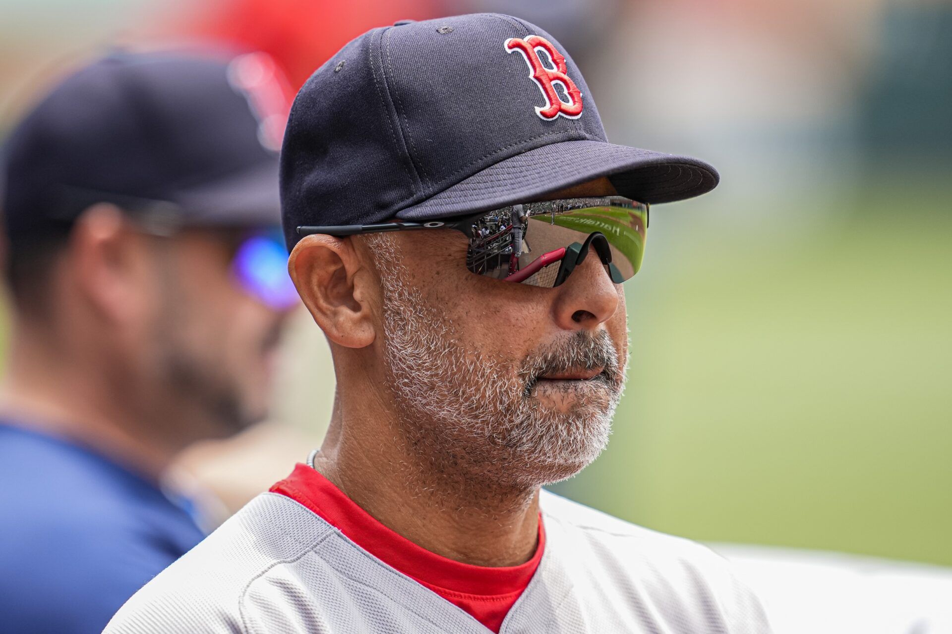 Boston Red Sox manager Alex Cora (13) shown in the dugout before the game against the Atlanta Braves at Truist Park.