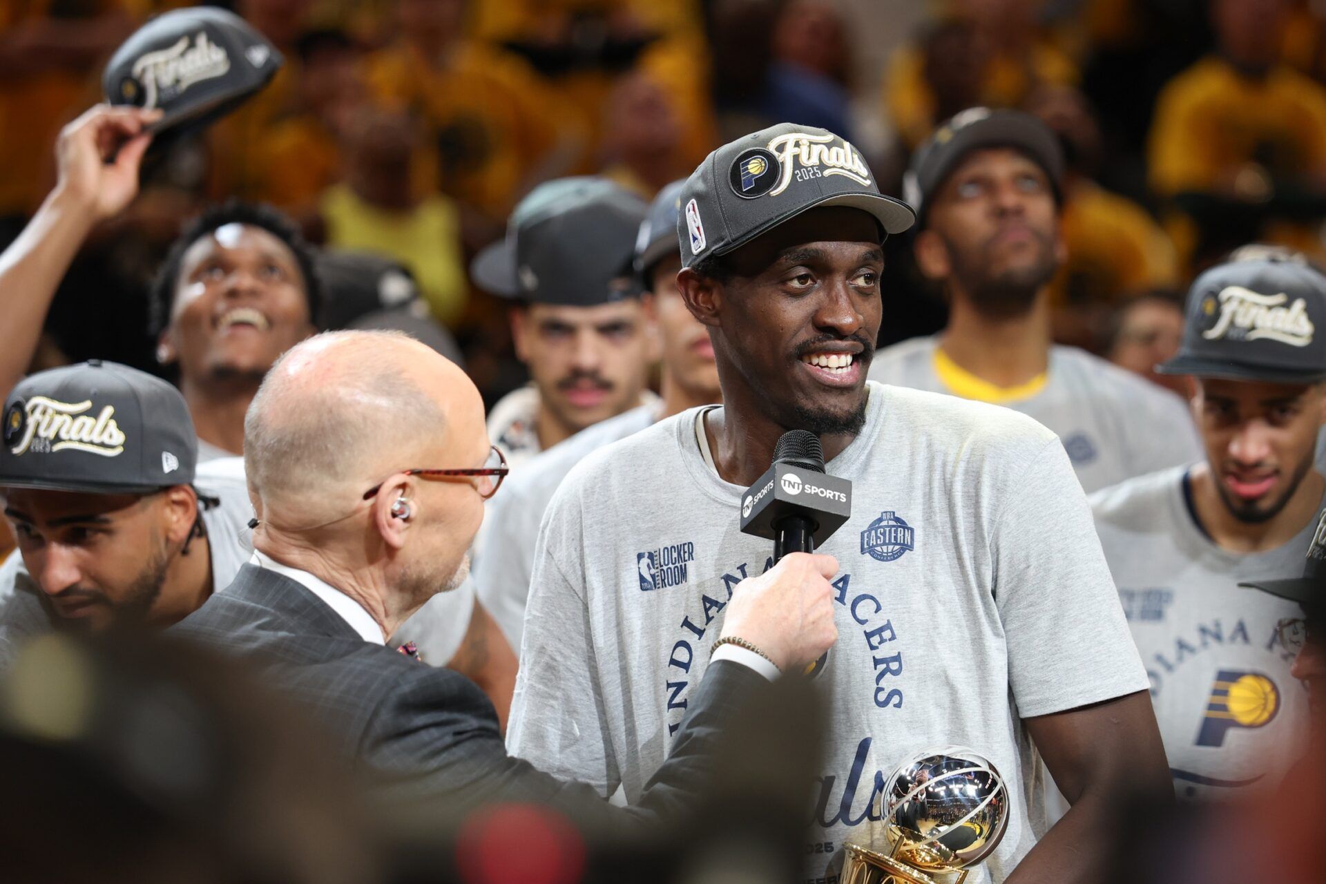Indiana Pacers forward Pascal Siakam (43) is interviewed by Ernie Johnson after receiving the Larry Bird MVP Trophy  game six of the eastern conference finals against the New York Knicks for the 2025 NBA Playoffs at Gainbridge Fieldhouse.