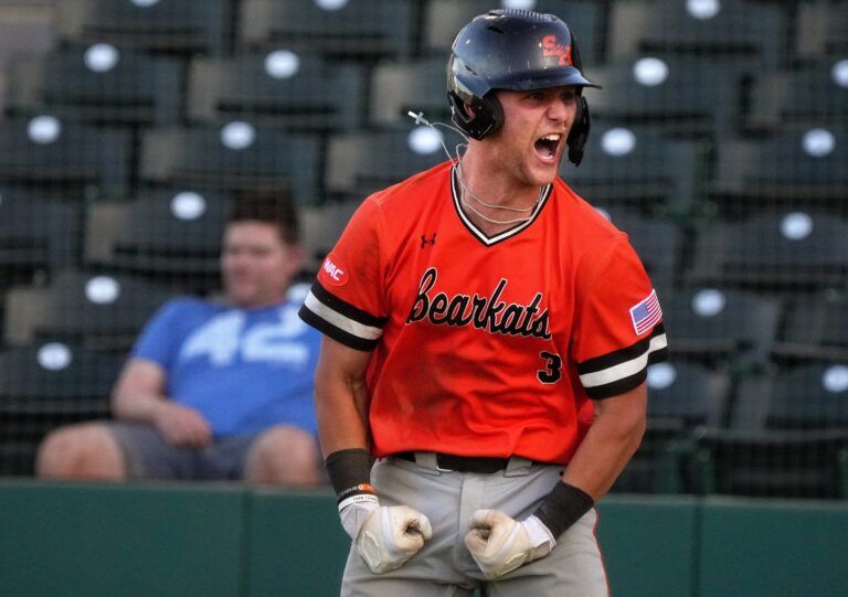 Sam Houston Bearkats' Walker Janek (3) celebrates his 3-run home run against the GCU Lobos during their WAC Tournament game at Hohokam Stadium.