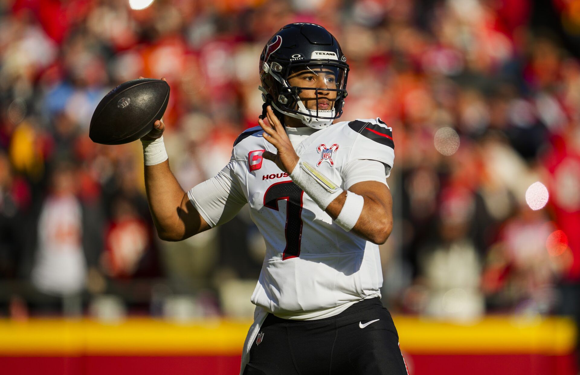 Houston Texans quarterback C.J. Stroud (7) throws a pass during the first half against the Kansas City Chiefs at GEHA Field at Arrowhead Stadium.