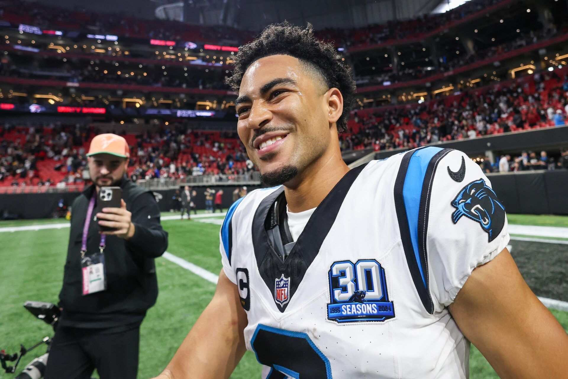 Carolina Panthers quarterback Bryce Young (9) celebrates after a victory over the Atlanta Falcons in overtime at Mercedes-Benz Stadium.