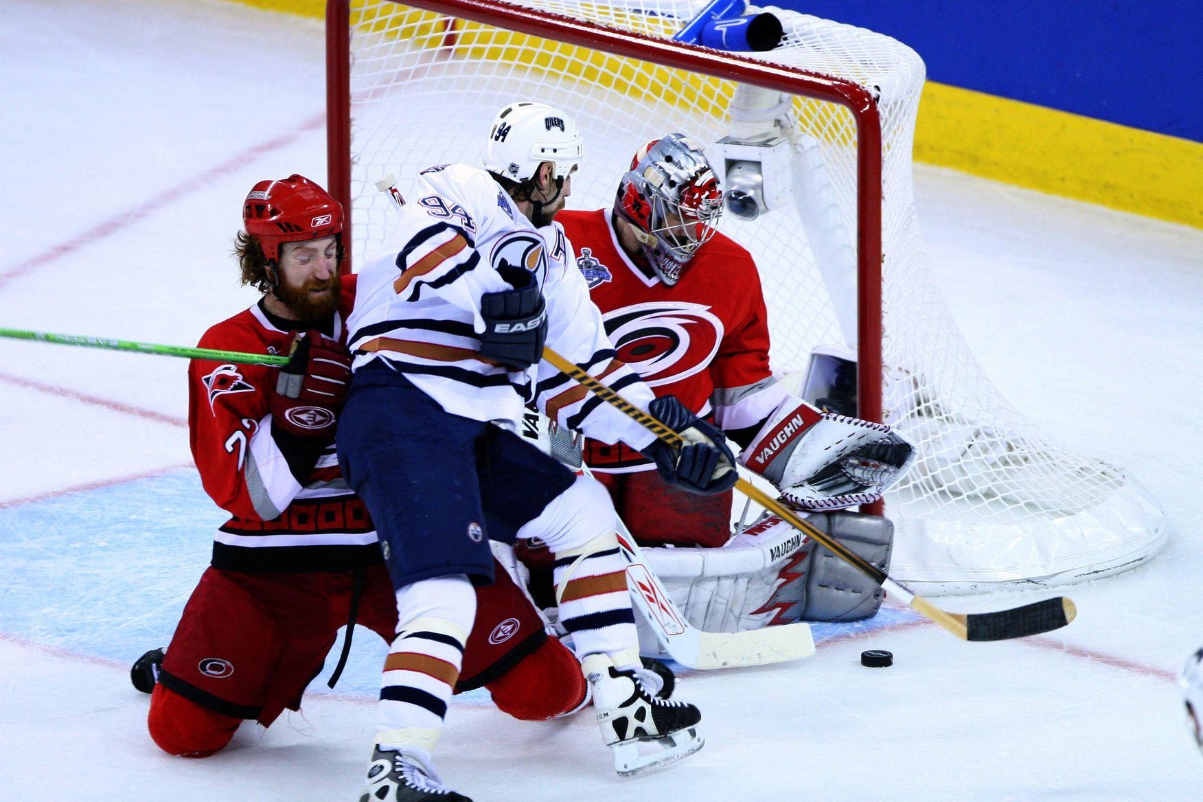 Carolina Hurricanes goaltender (30) Cam Ward and defensemen (22) Mike Commodore stop the Edmonton Oilers left wing (94) Ryan Smyth during the 2nd period in game 7 of the NHL Stanley Cup Finals at the RBC Center.