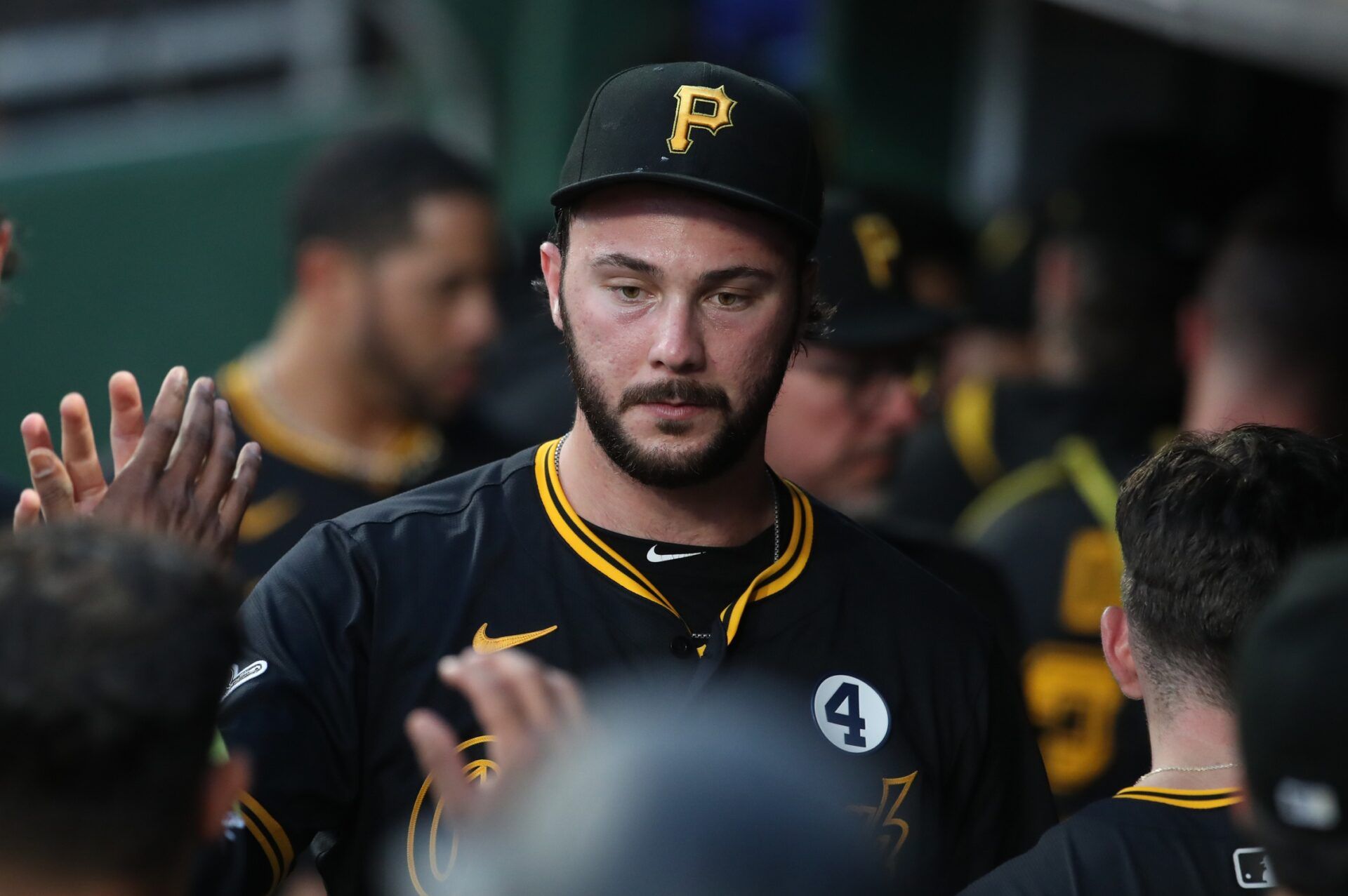 Pittsburgh Pirates starting pitcher Paul Skenes (30) high-fives in the dugout after pitching the eighth inning against the Houston Astros at PNC Park.