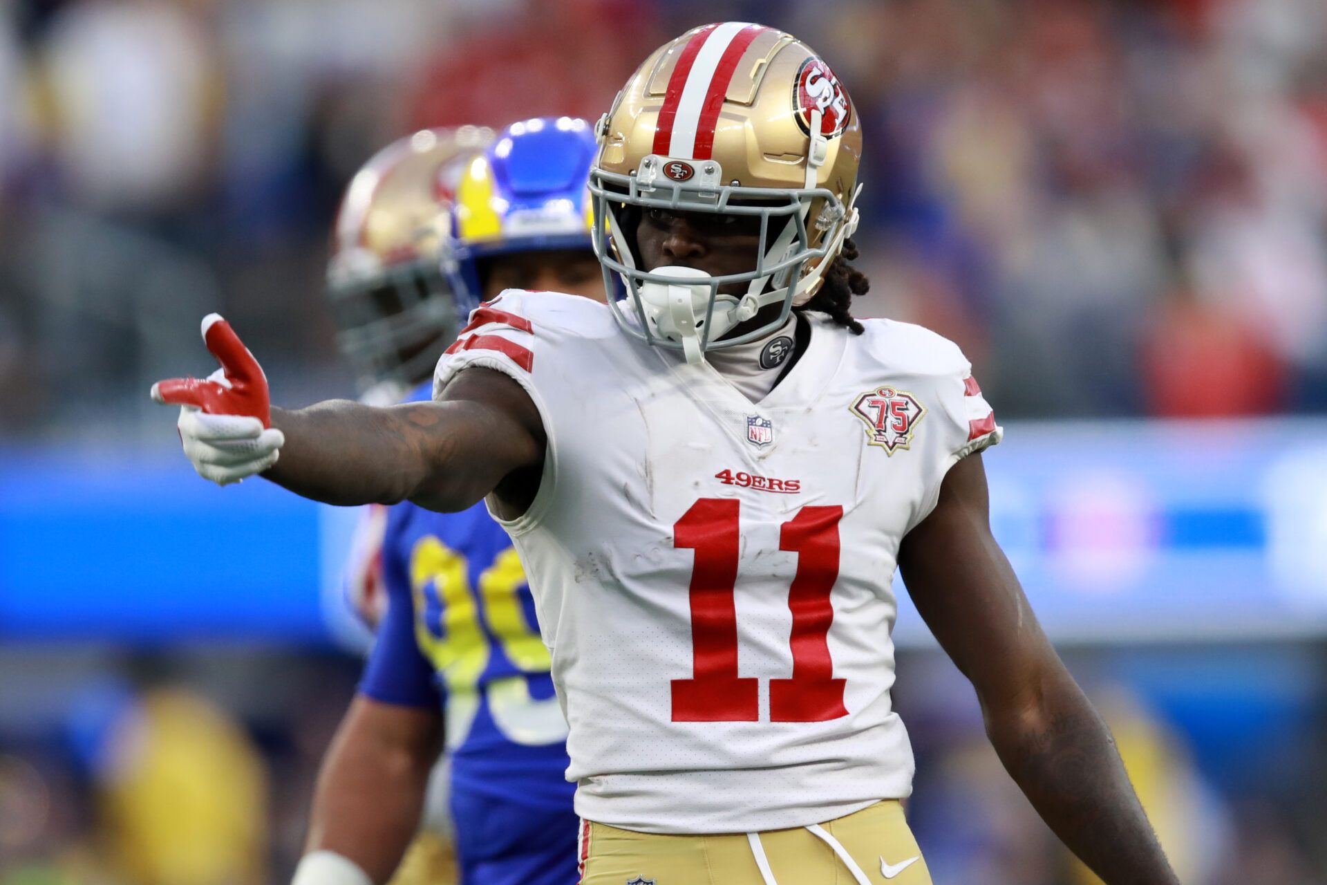 INGLEWOOD, CALIFORNIA - JANUARY 09: Brandon Aiyuk #11 of the San Francisco 49ers reacts during the fourth quarter against the Los Angeles Rams at SoFi Stadium on January 09, 2022 in Inglewood, California. (Photo by Joe Scarnici/Getty Images)