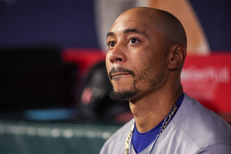 Los Angeles Dodgers shortstop Mookie Betts (50) in the dugout against the Atlanta Braves in the seventh inning at Truist Park.
