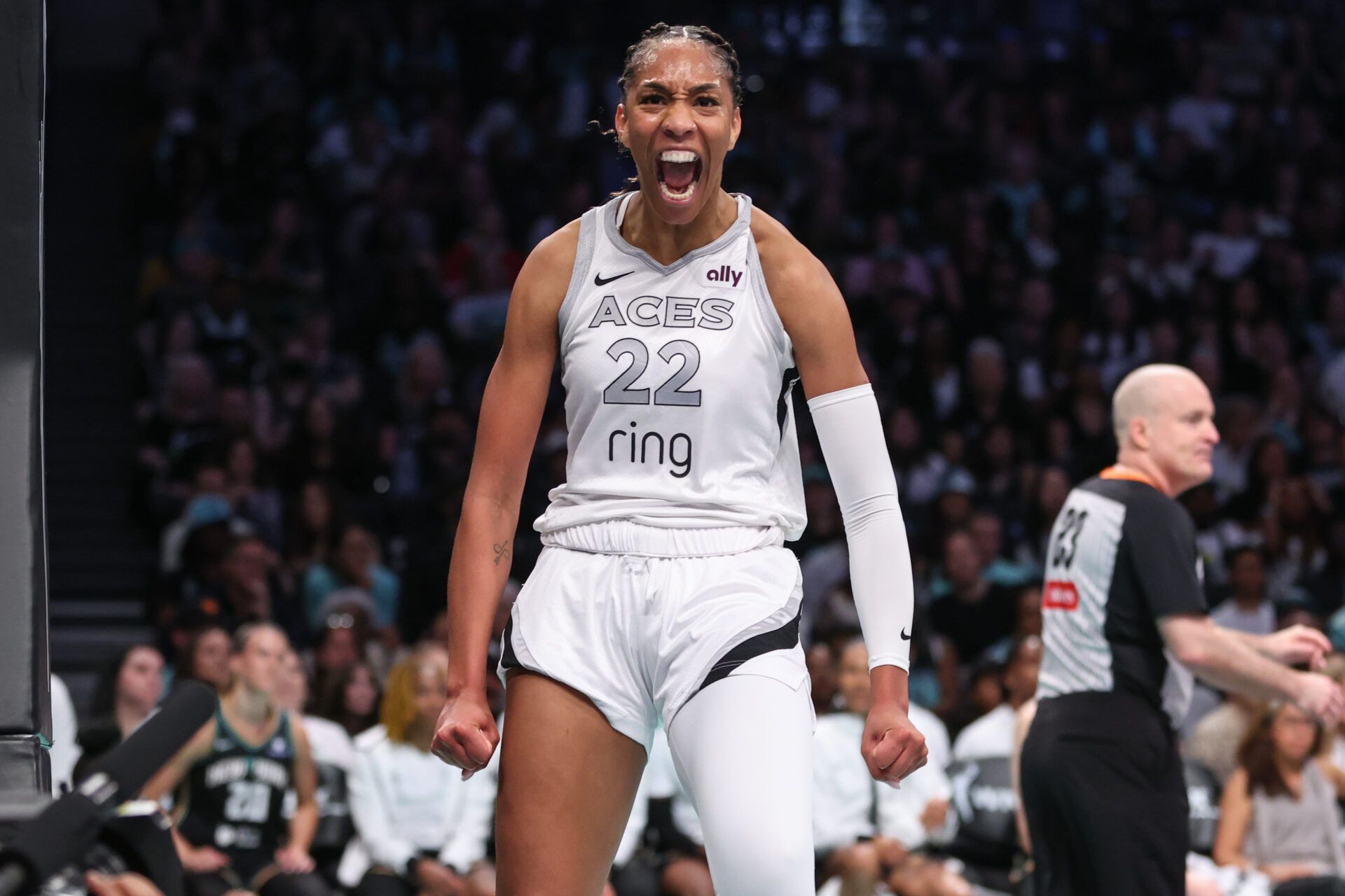 Las Vegas Aces center A'ja Wilson (22) reacts after getting fouled after a made basket in the first quarter against the New York Liberty at Barclays Center.