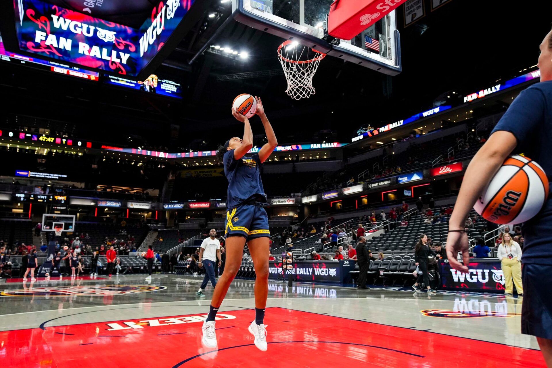 Indiana Fever forward Brianna Turner (11) warms up Tuesday, May 20, 2025, before a game between the Indiana Fever and the Atlanta Dream at Gainbridge Fieldhouse in Indianapolis.
