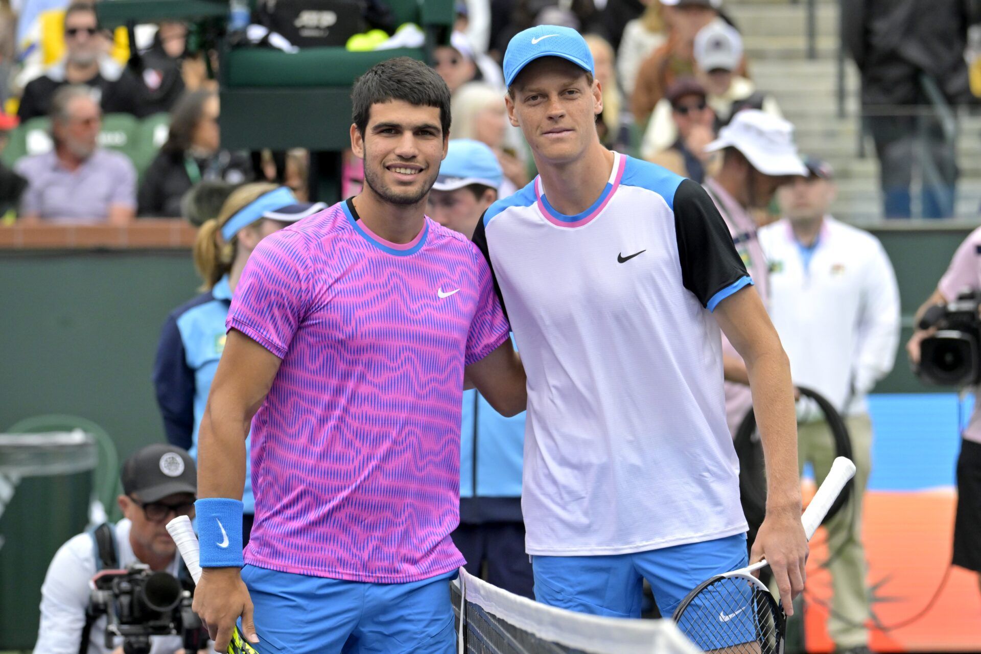 Carlos Alcaraz (ESP) and Jannik Sinner (ITA) pose for a photo prior to the start of their semi-final match in the BNP Paribas Open at the Indian Wells Tennis Garden.