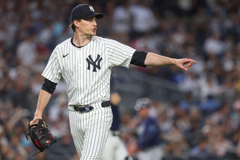 New York Yankees starting pitcher Max Fried (54) reacts after a double play ending the third inning against the Tampa Bay Rays at Yankee Stadium.