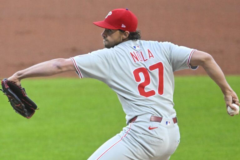 Philadelphia Phillies starting pitcher Aaron Nola (27) delivers a pitch in the first inning against the Cleveland Guardians at Progressive Field.