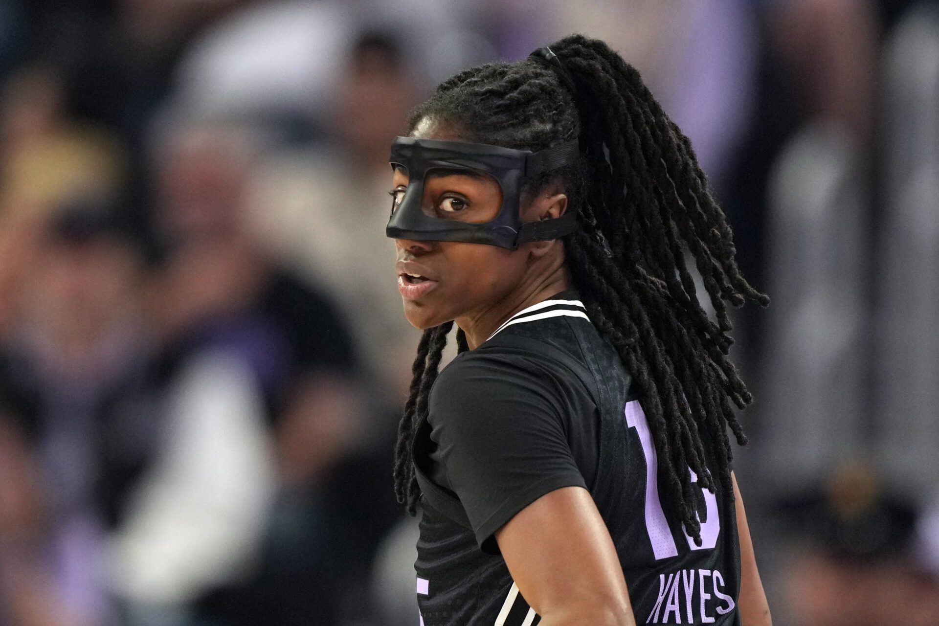Golden State Valkyries guard Tiffany Hayes (15) wears a protective mask during the first quarter against the Minnesota Lynx at Chase Center.